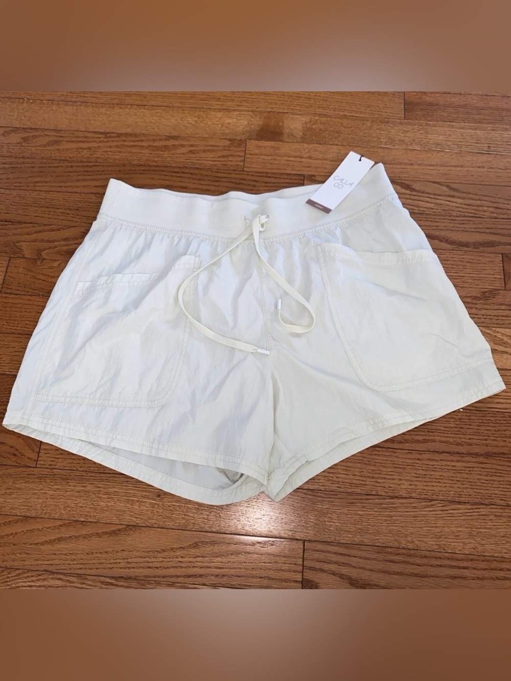 Calia Journey Mid Rise Shorts 4" Sage Dune Size‎ Medium NWT Relaxed Fit